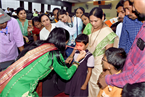 Yogita training the child for VT device